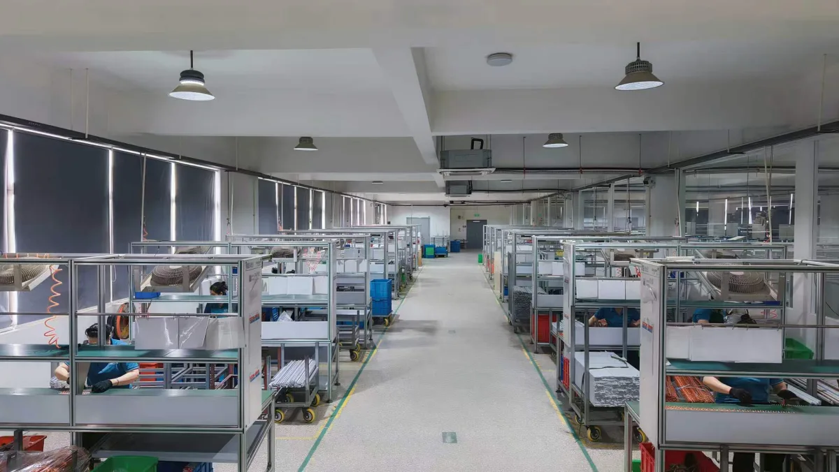 KASEEY employees assembling components at dedicated workstations